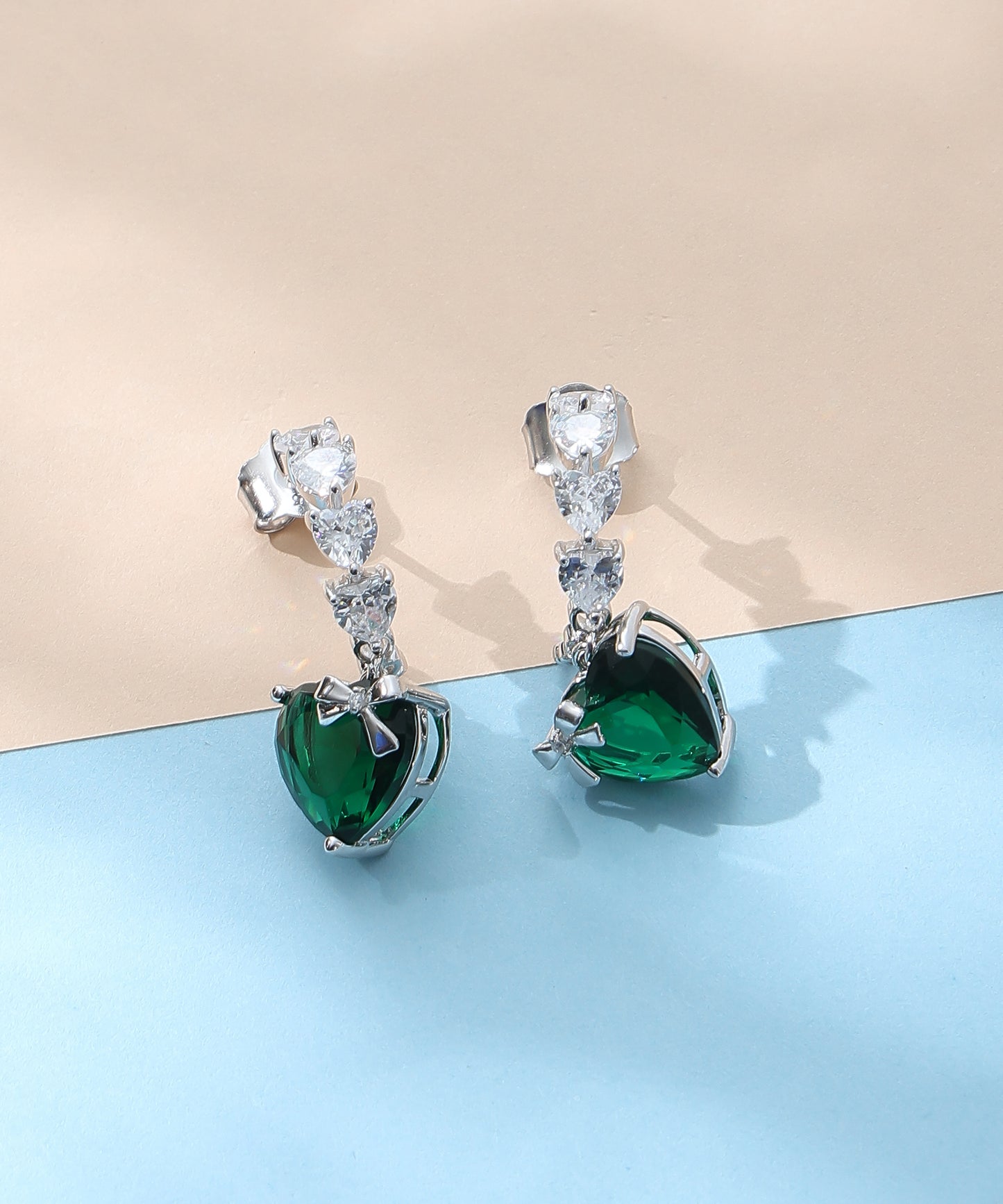 Siora Jewels Emerald Heart 925 Silver Earrings for Women | Rhodium Finish with Zircon Detailing & Bow Accent